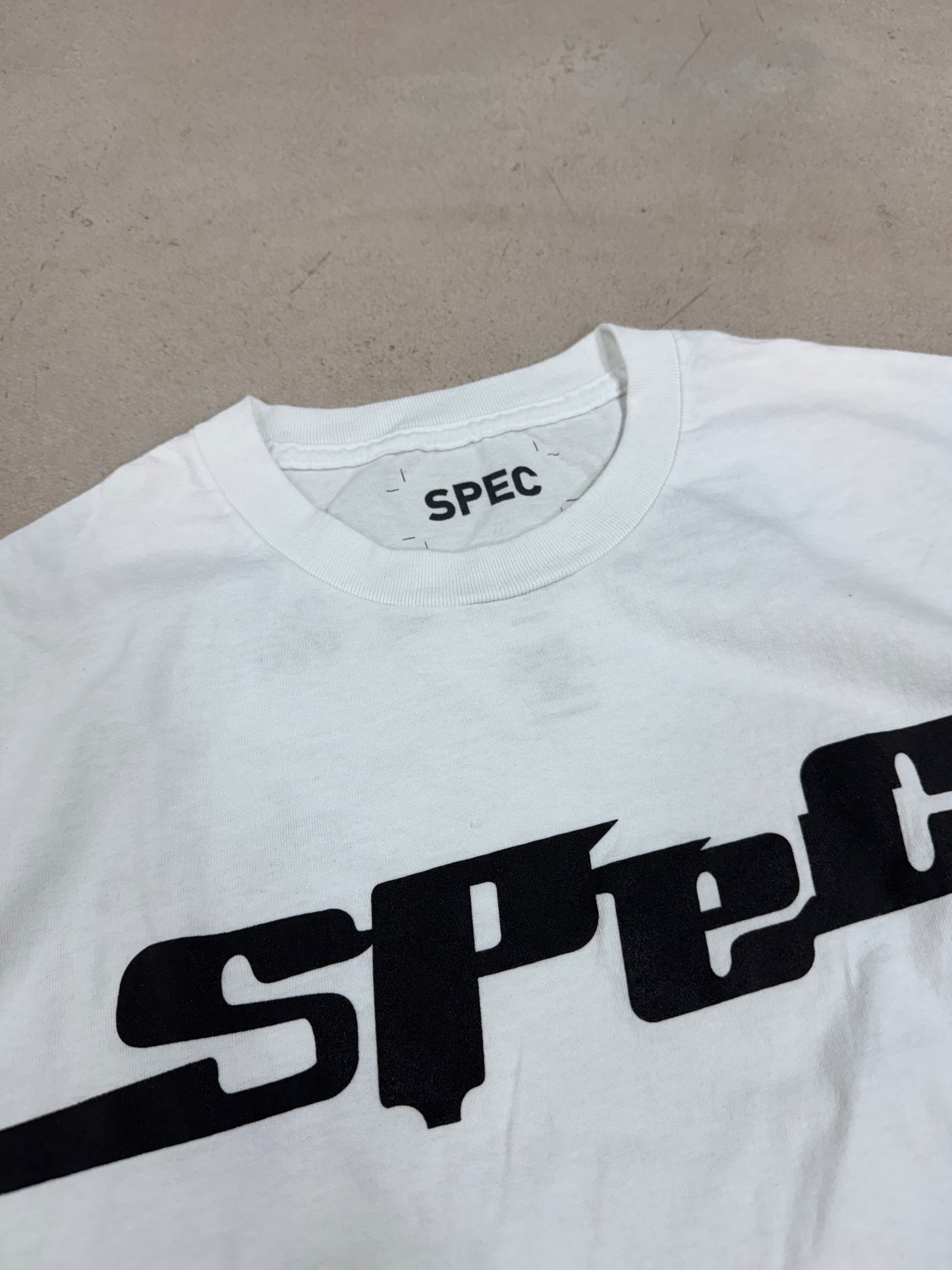 spec chest logo white
