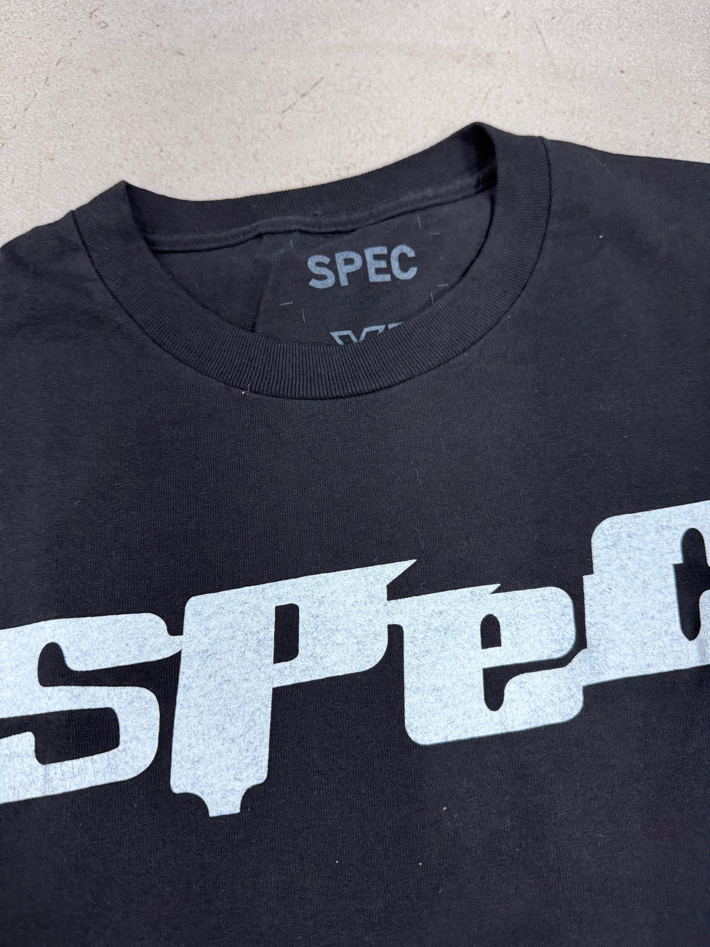 spec chest logo black
